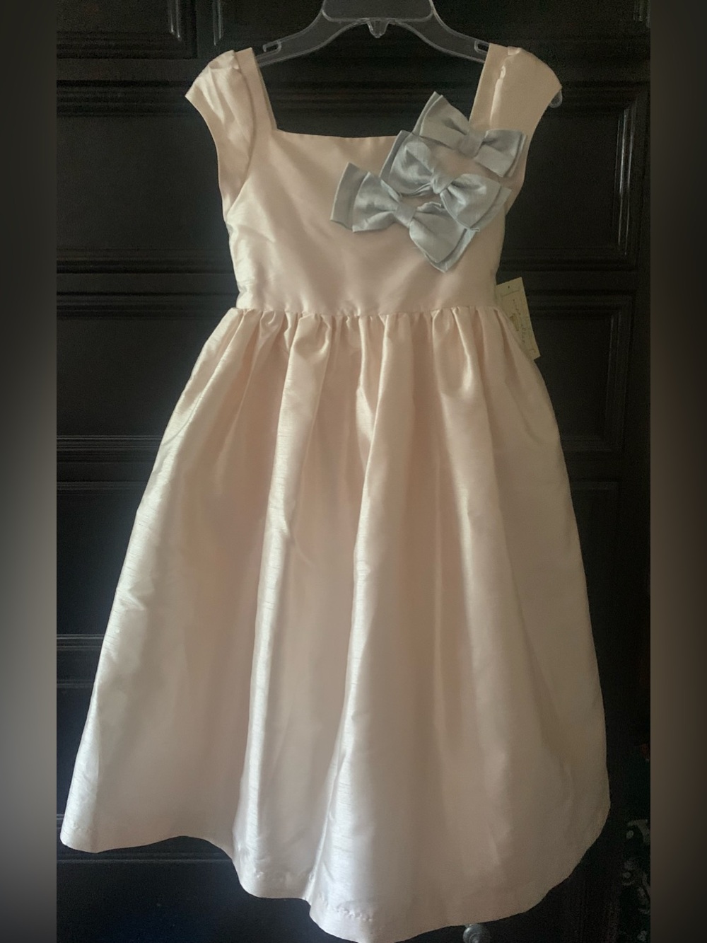 Girls' Pale Pink Satin Occasion Dress with Blue Bow Accents